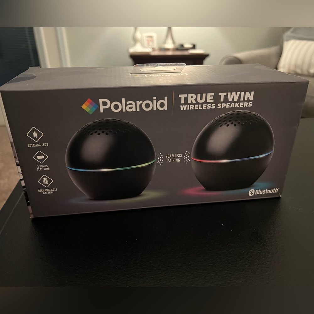 Two Polaroid Bluetooth speakers